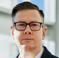 Executivo de empresa de negociação de criptomoedas, CEO Alexander Hughes em retrato